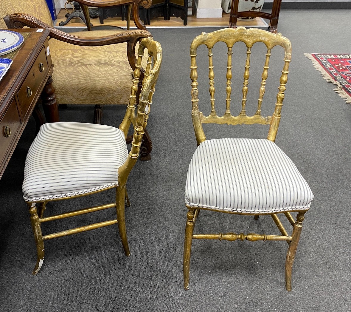 A set of four giltwood chairs